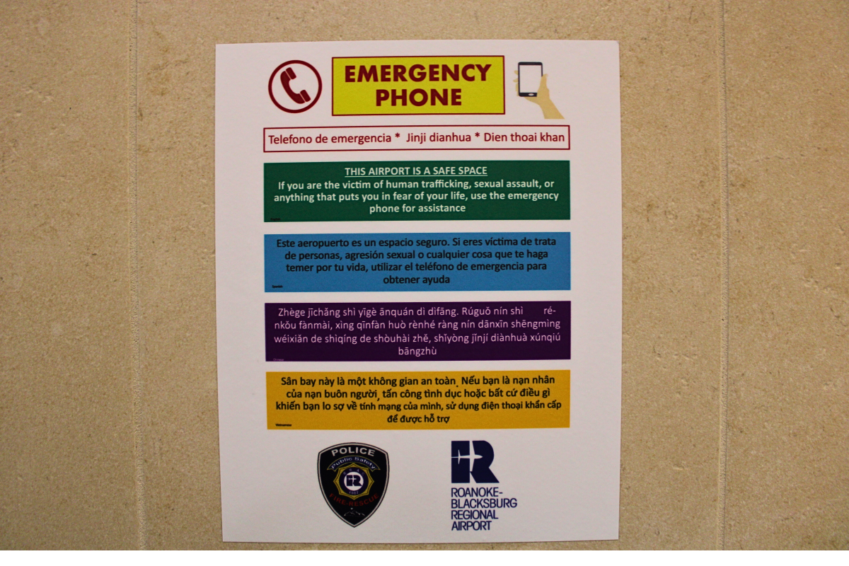 Photo of emergency restroom phone stall sign